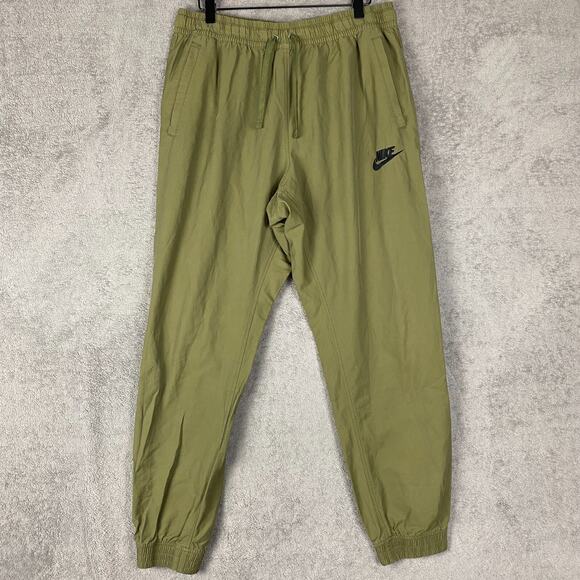 Nike Tech Woven Men Pants 2XL Olive Green Drawstring Waist Tapered Leg Trousers - Picture 1 of 14